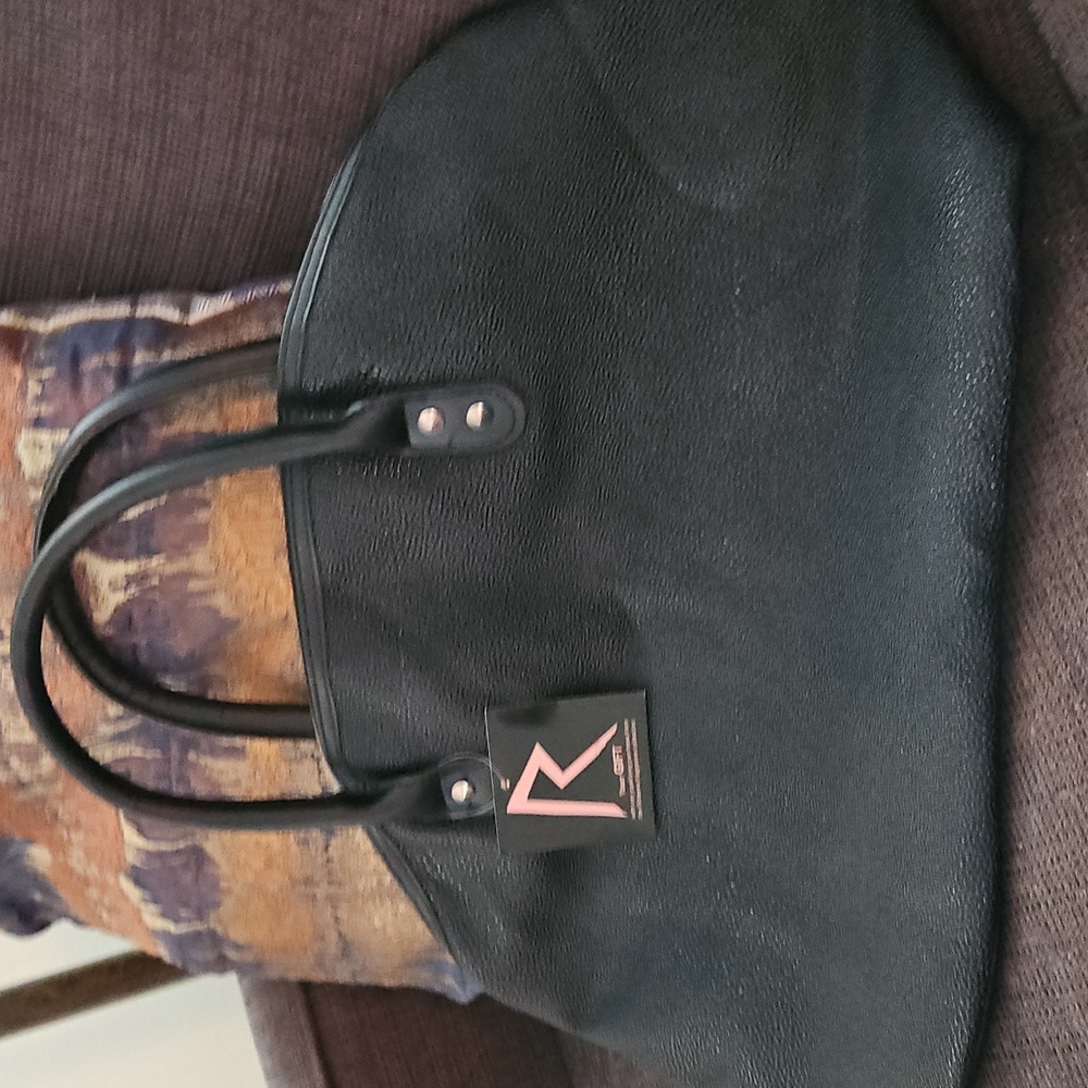 Rihanna Black Pebbled Handbag